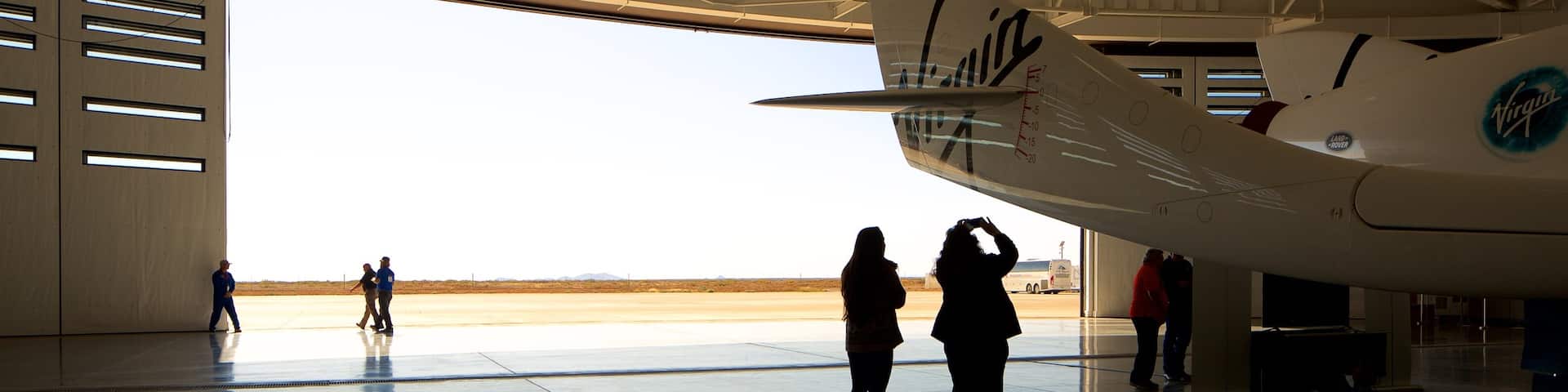 Spaceport America showing interior views, aircraft and industrial elements