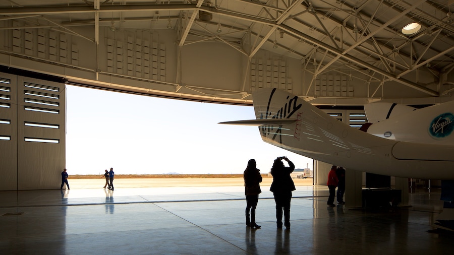 Spaceport America showing interior views, aircraft and industrial elements
