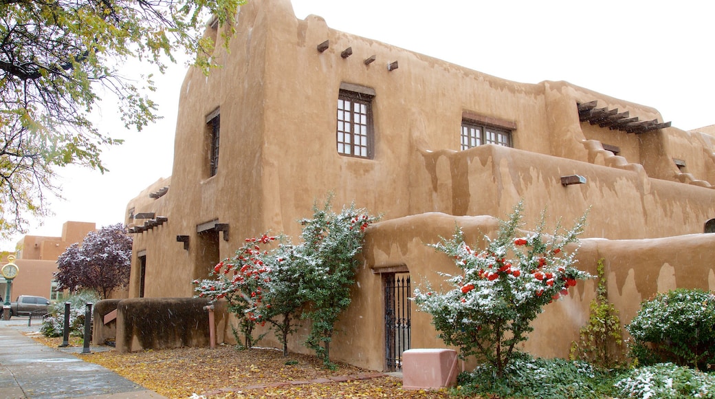 Santa Fe Plaza which includes street scenes and a house