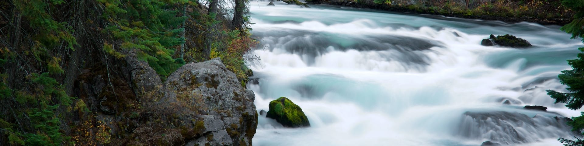 La Pine featuring a river or creek and rapids