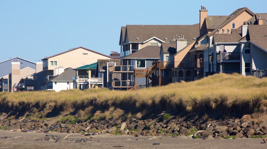 Ocean Shores Beach toont een strand en een huis