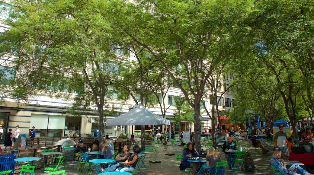 Westlake Center featuring a square or plaza as well as a large group of people