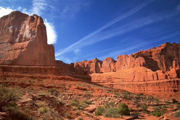 Arches National Park showing desert views, a gorge or canyon and tranquil scenes