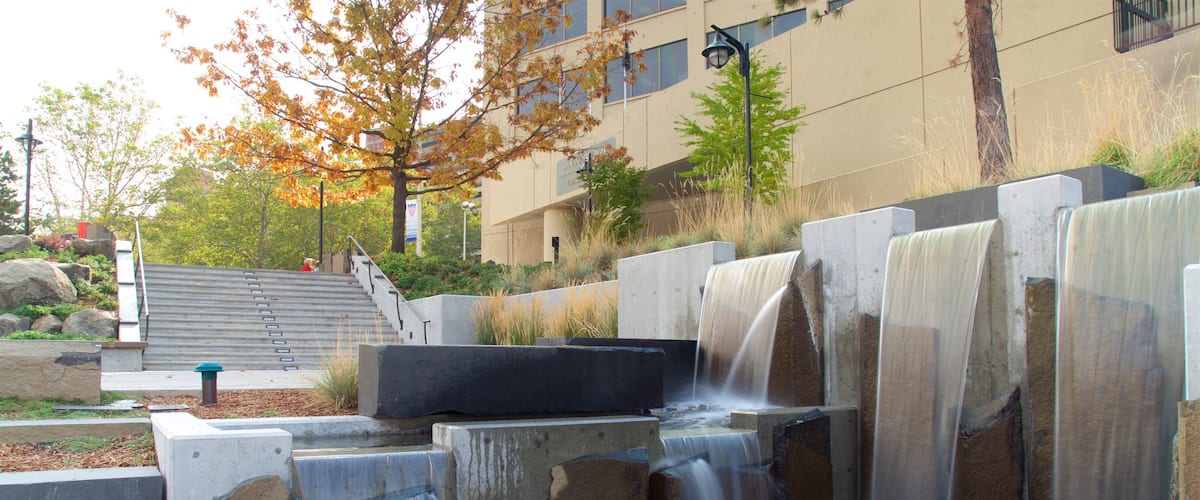 Riverfront Park showing a pond, modern architecture and a garden