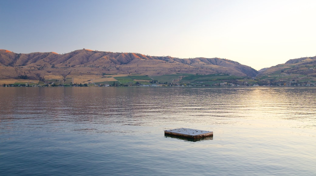 Lake Chelan featuring a lake or waterhole, tranquil scenes and a sunset