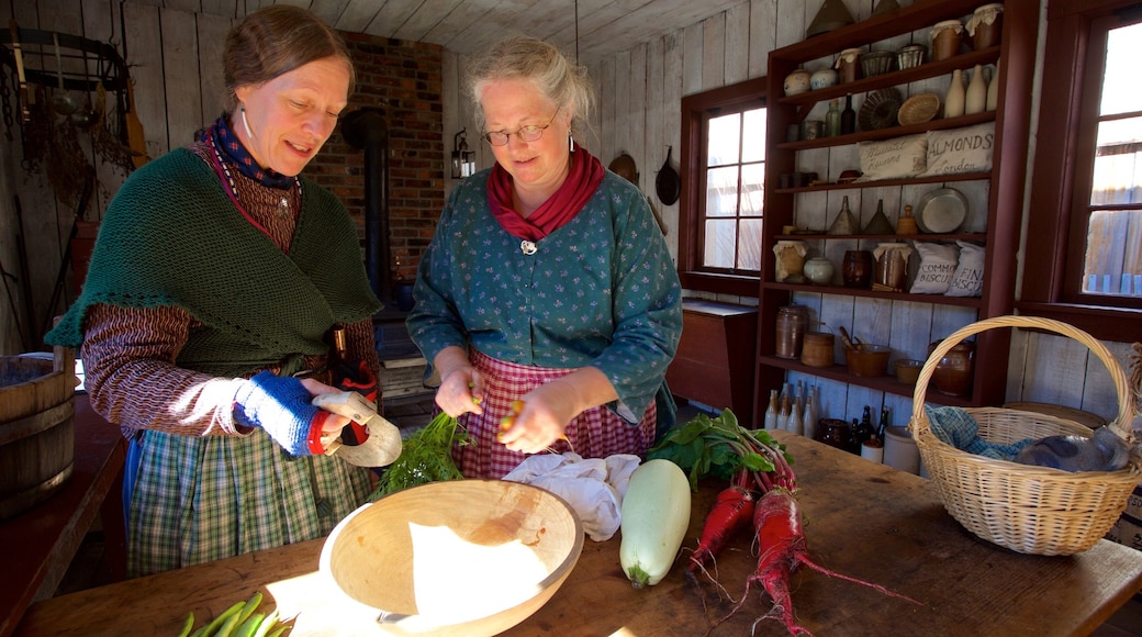 Fort Nisqually Living History Museum showing interior views as well as a small group of people