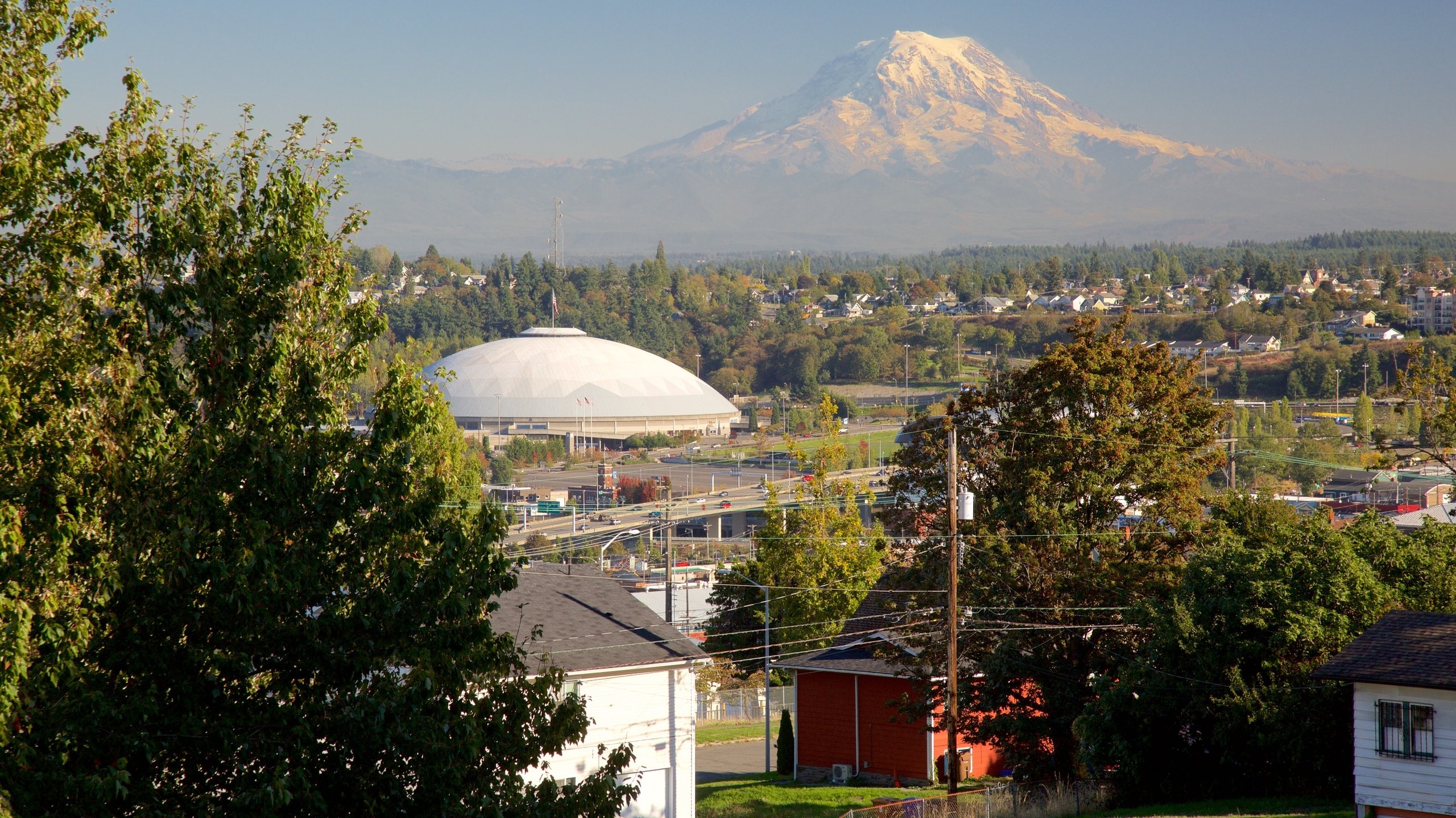 Tacoma showing mountains and a small town or village