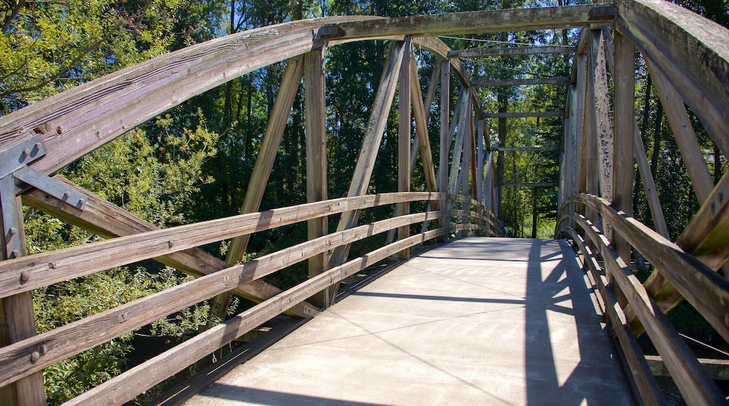 Park at Bothell Landing featuring a bridge and a garden