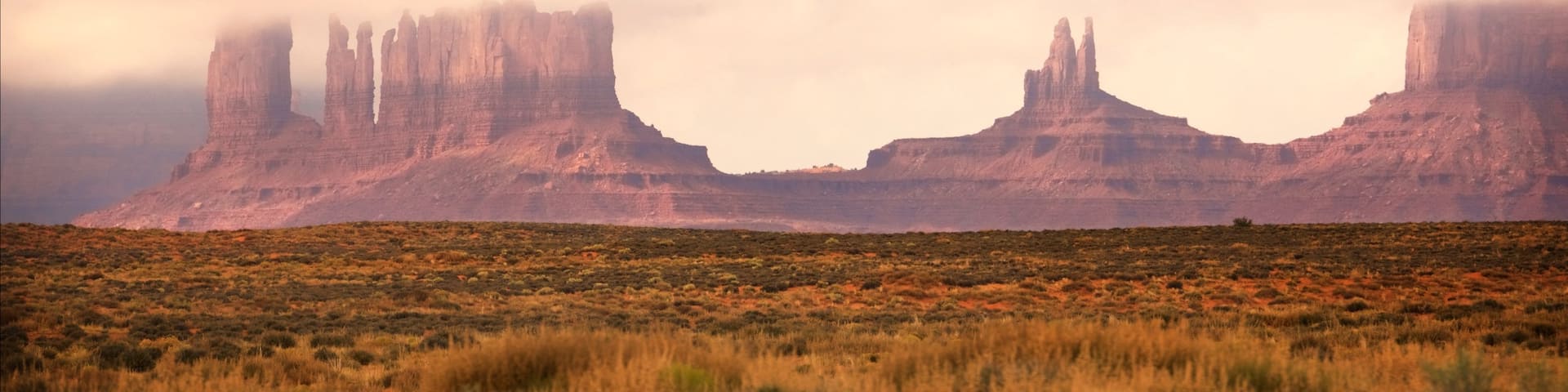 Monument Valley showing a gorge or canyon, landscape views and tranquil scenes