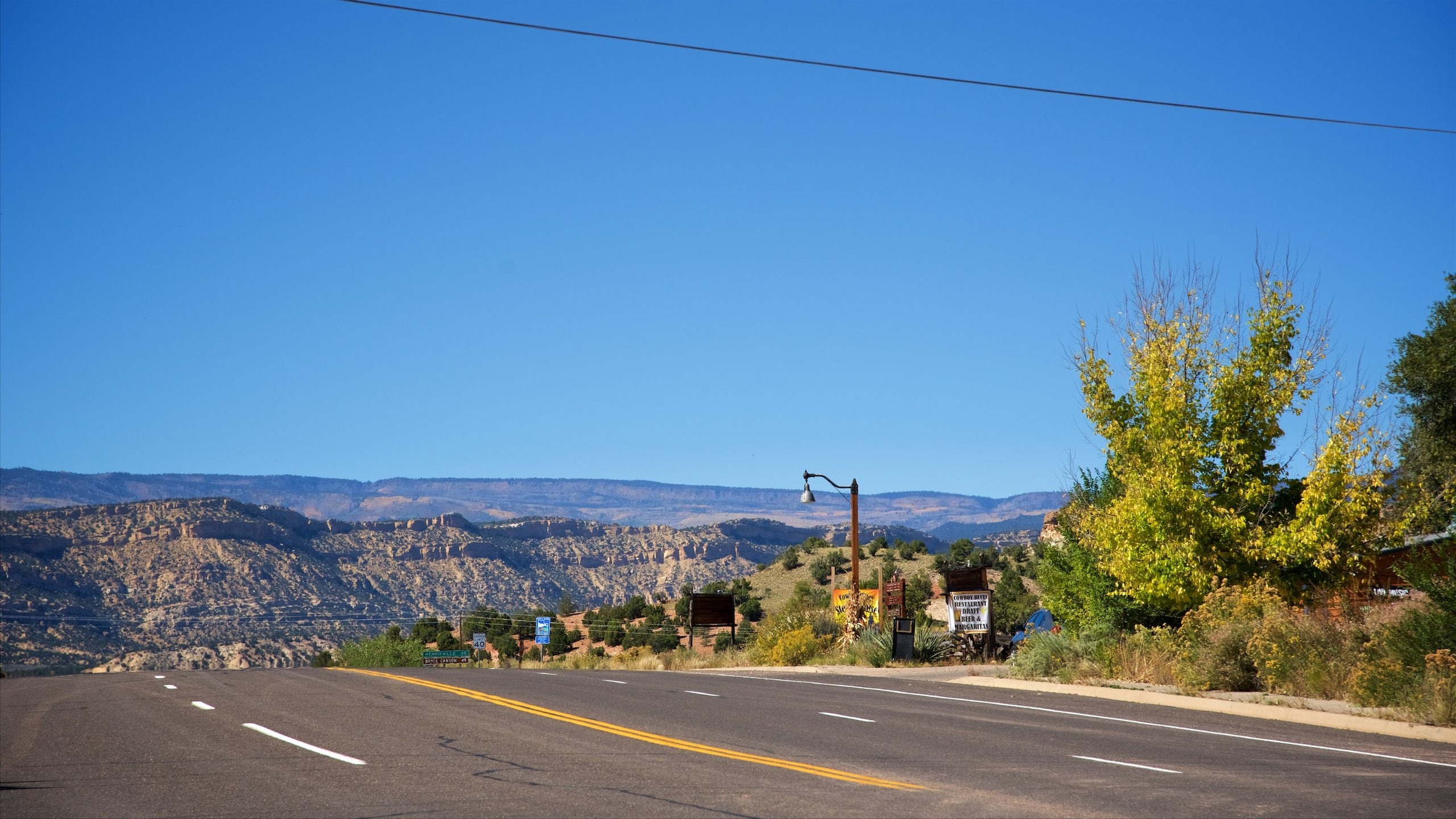 Escalante which includes tranquil scenes, a gorge or canyon and desert views