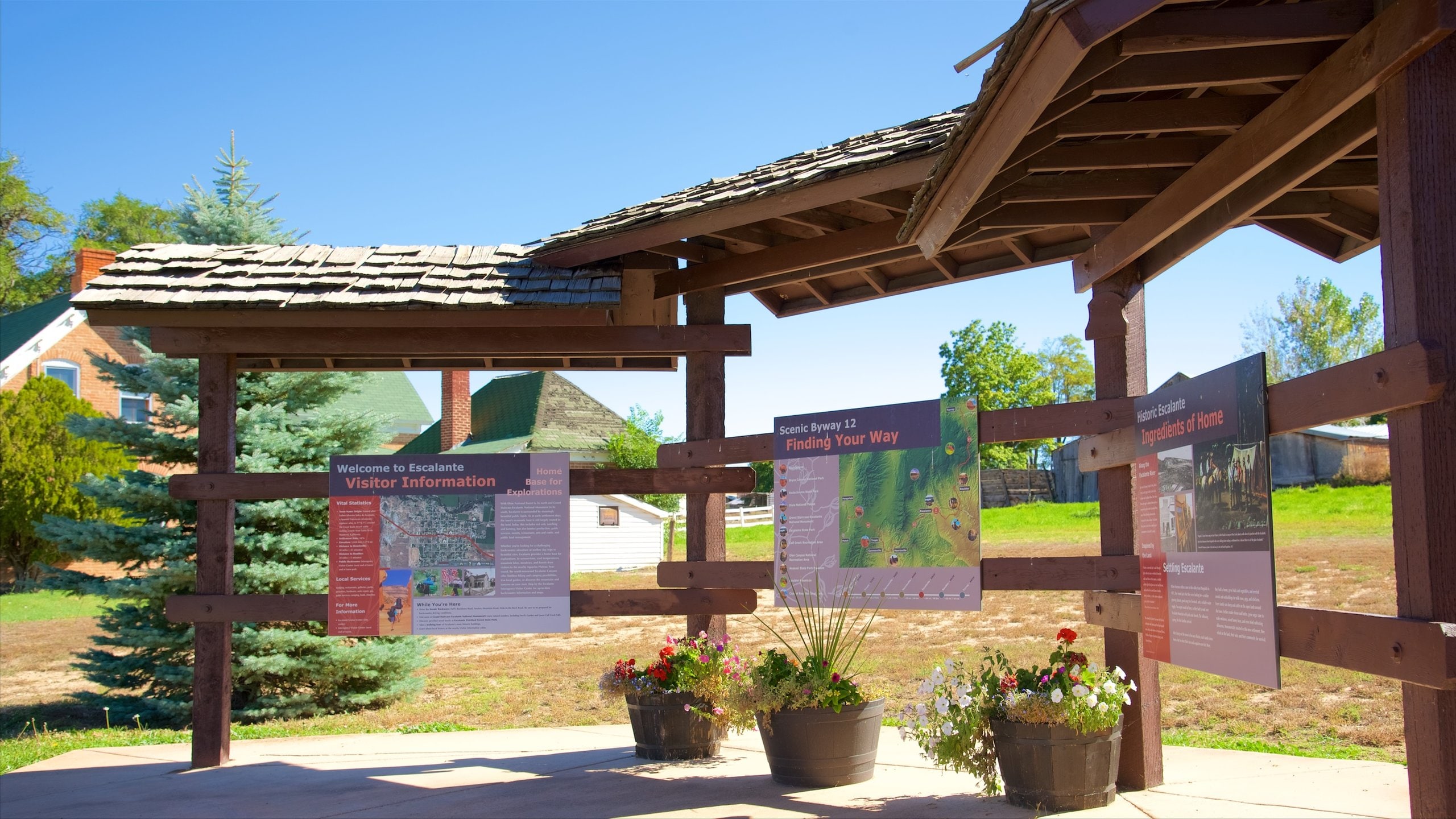 Escalante featuring signage and tranquil scenes
