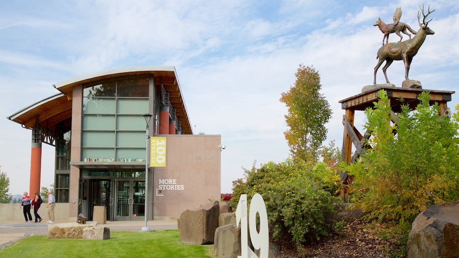 Northwest Museum of Arts & Culture which includes modern architecture and a statue or sculpture