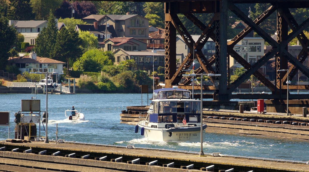 Hiram M. Chittenden Locks which includes a coastal town, a river or creek and boating