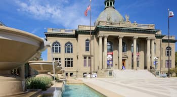 Redwood City featuring a fountain, heritage architecture and an administrative building