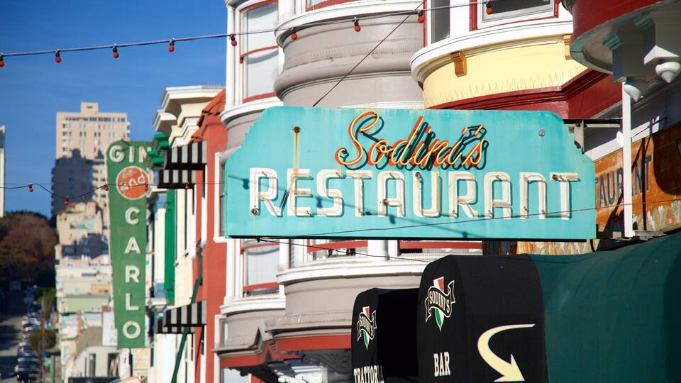 North Beach featuring signage, a city and a coastal town