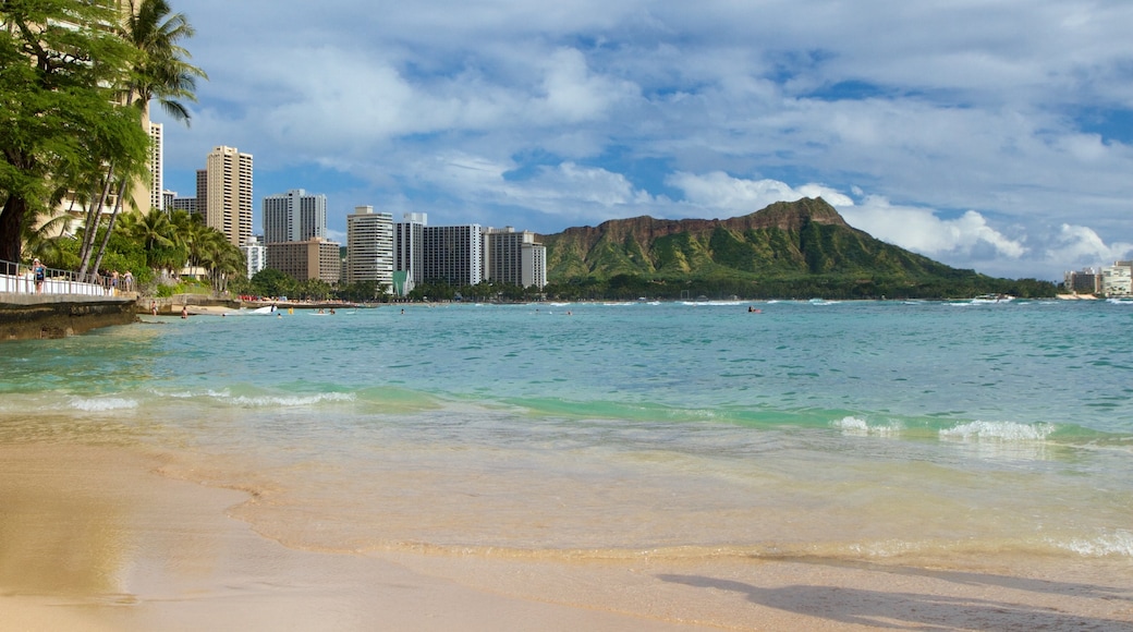 Waikiki Beach which includes mountains, a sandy beach and a city