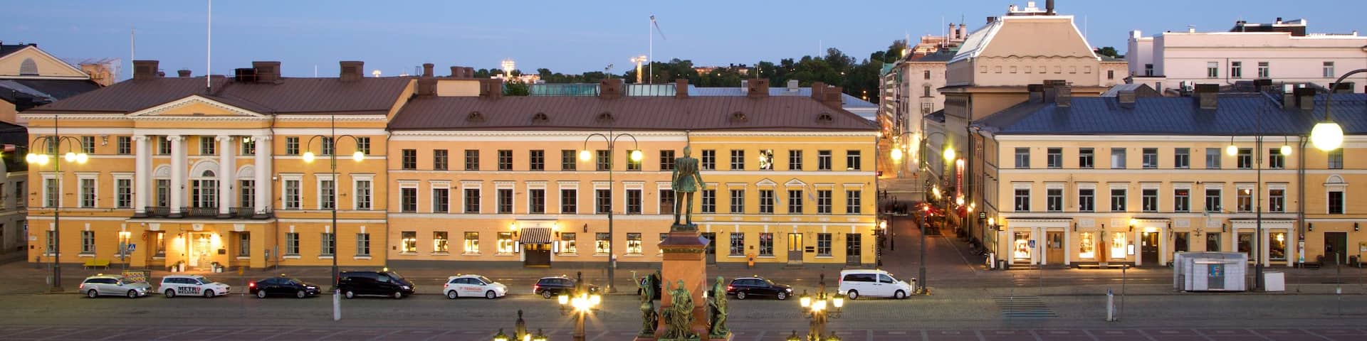 Senate Square showing night scenes, a monument and a square or plaza