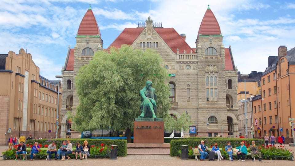 National Theater which includes a statue or sculpture, heritage architecture and theatre scenes