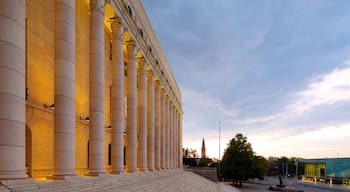 Parliament Building which includes a sunset and an administrative buidling