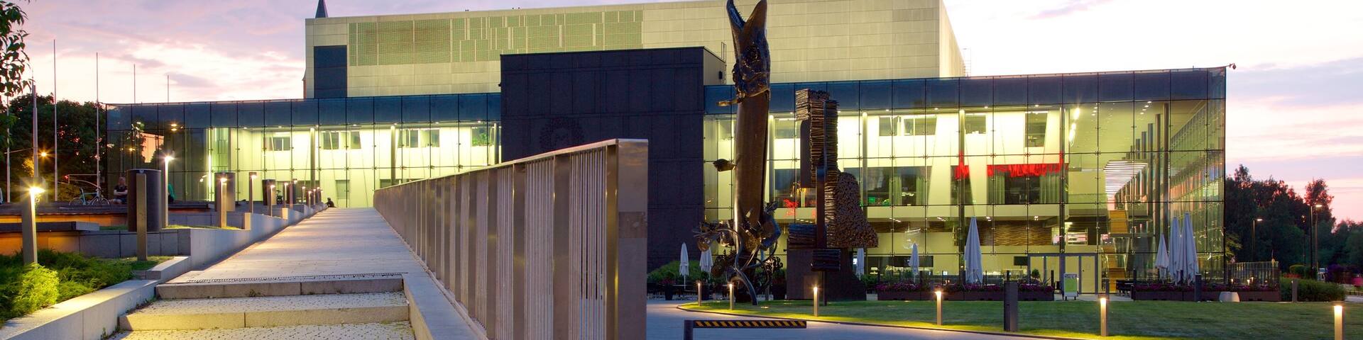 Helsinki featuring a sunset and modern architecture