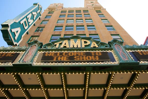 Tampa Theater featuring heritage architecture, theatre scenes and signage