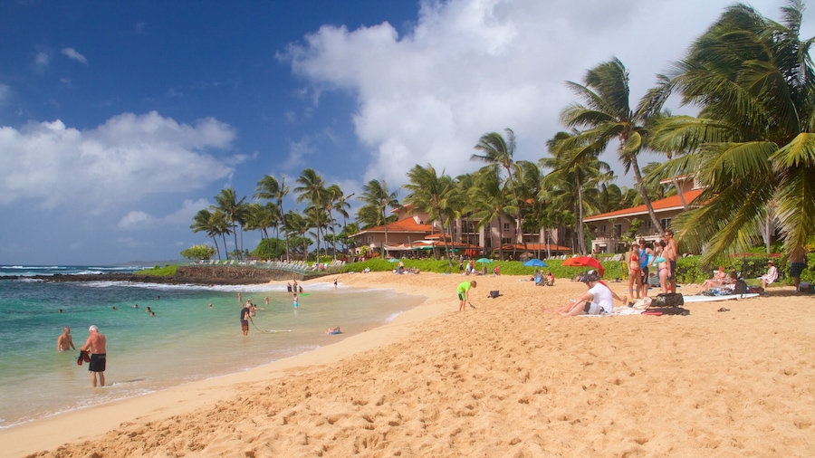 Koloa which includes general coastal views and a beach