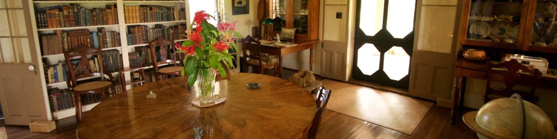 Grove Farm Homestead which includes flowers and interior views