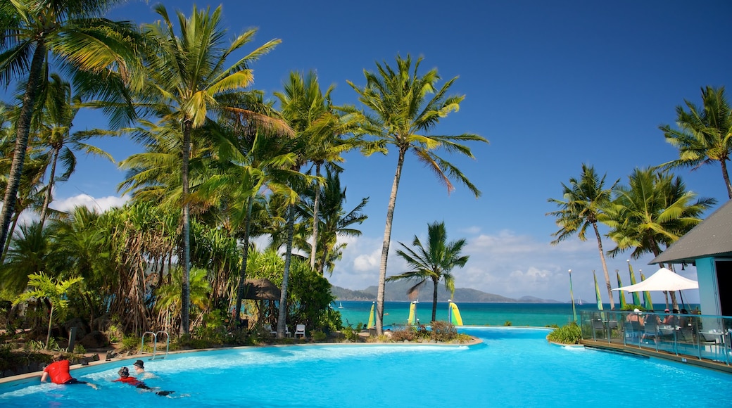 Catseye Beach showing a luxury hotel or resort, swimming and a pool