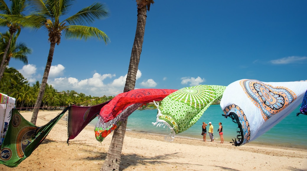 Airlie Beach featuring a sandy beach and tropical scenes