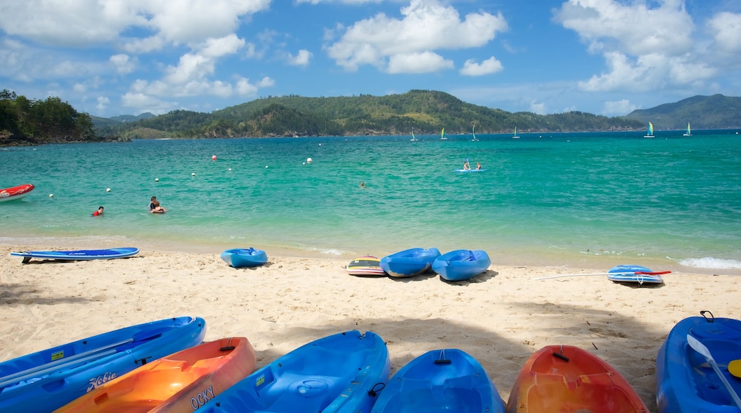 Catseye Beach showing a sandy beach, landscape views and kayaking or canoeing