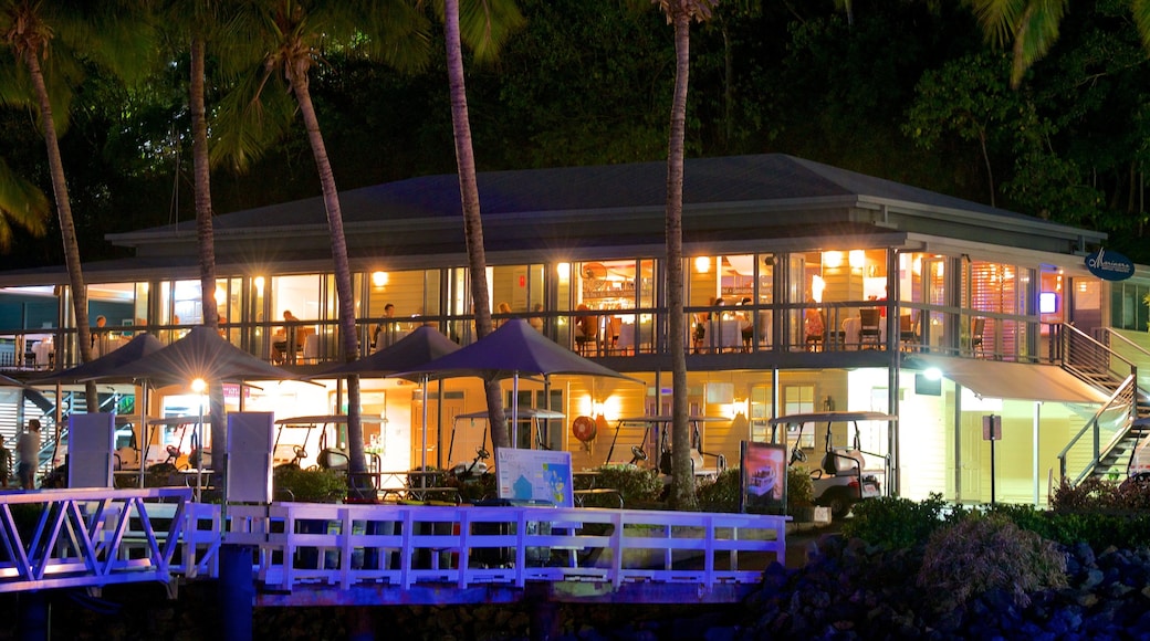 Hamilton Island Marina which includes dining out, outdoor eating and night scenes