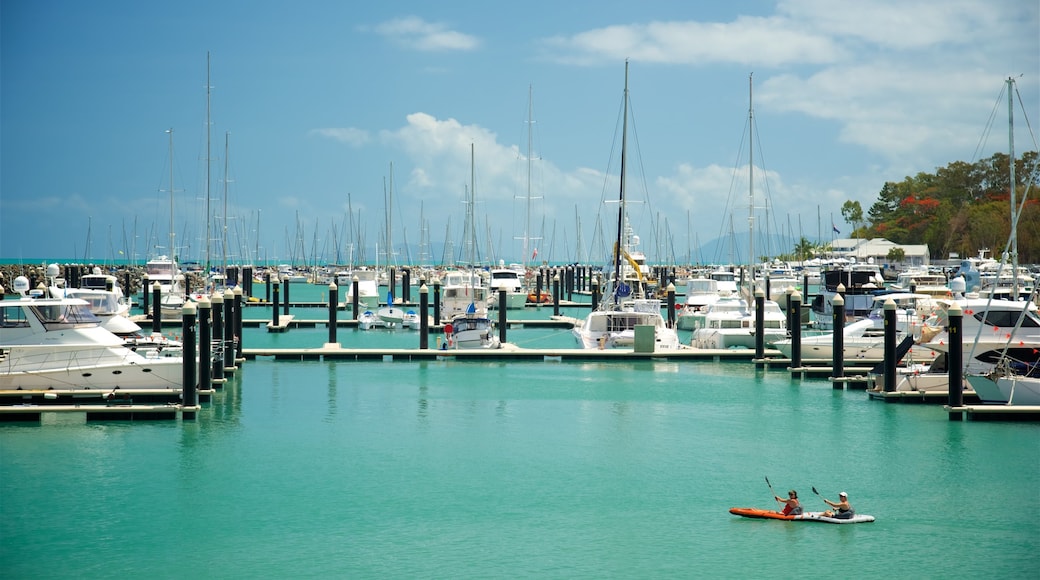 Airlie Beach which includes a bay or harbour, kayaking or canoeing and sailing