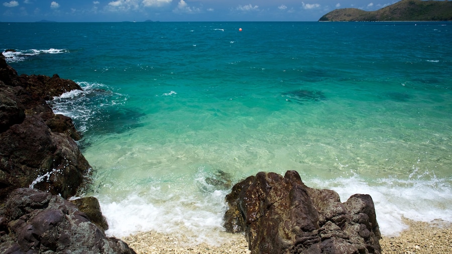 Daydream Island which includes a pebble beach, landscape views and rugged coastline