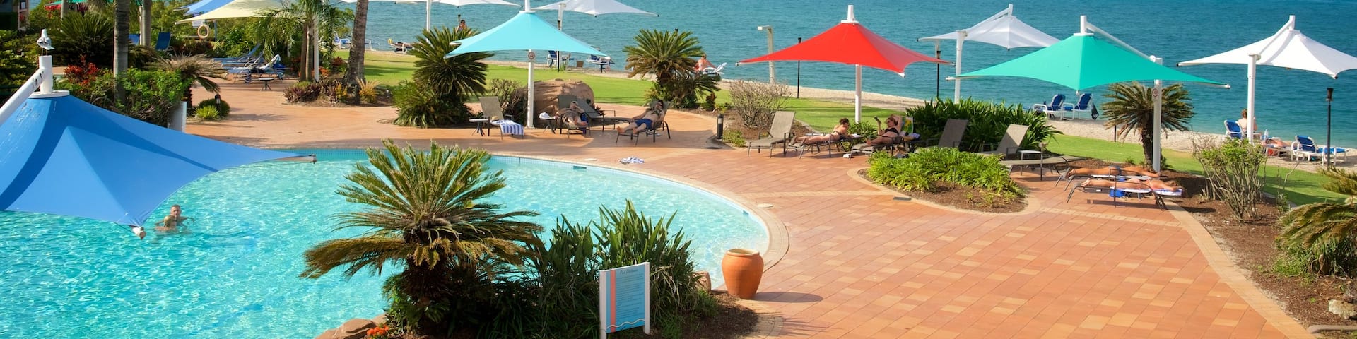 Daydream Island Rejuvenation Day Spa showing a pool and general coastal views