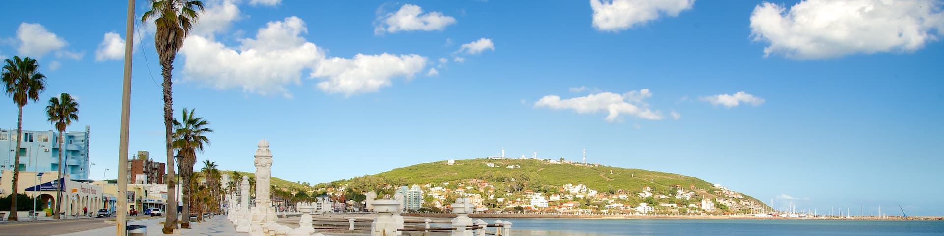 Piriapolis Beach showing street scenes, landscape views and a coastal town