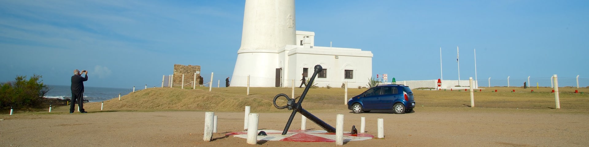 Cape Santa Maria Lighthouse which includes a lighthouse as well as an individual male