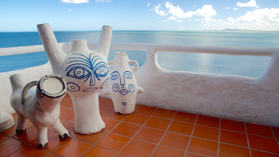 Punta Ballena which includes a statue or sculpture, art and general coastal views