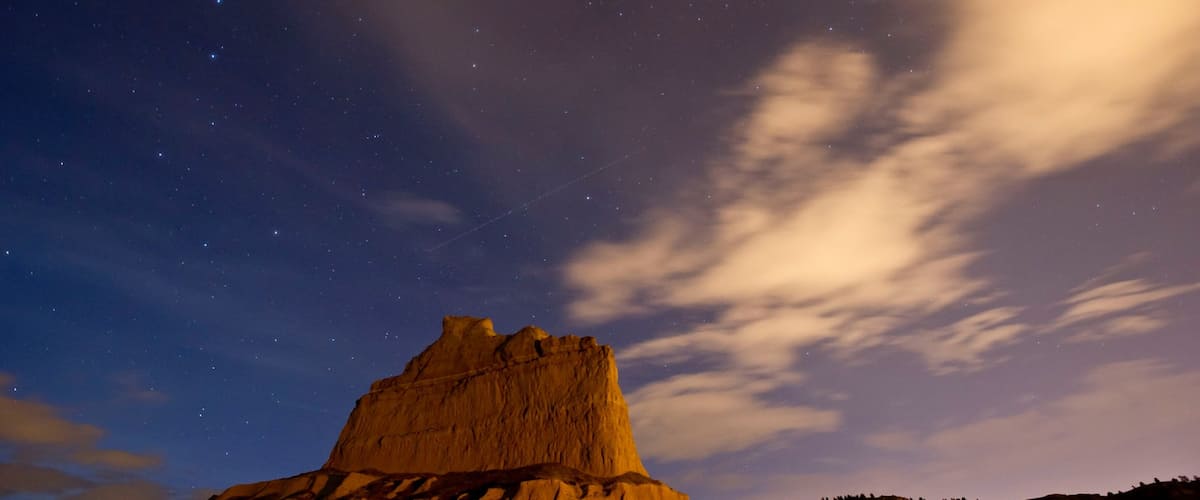 Scottsbluff which includes mountains, tranquil scenes and a sunset
