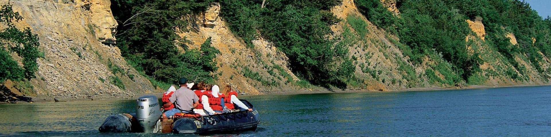 Niobrara showing a river or creek and boating as well as a small group of people