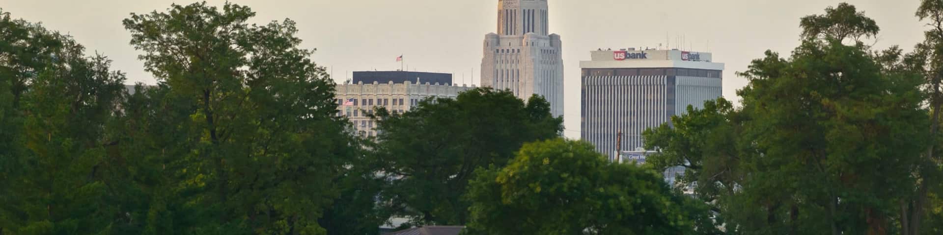 Nebraska State Capitol which includes a river or creek and kayaking or canoeing as well as an individual male