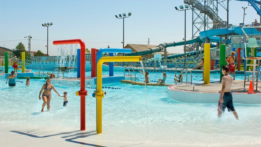 Island Oasis Water Park which includes swimming and a water park as well as a small group of people