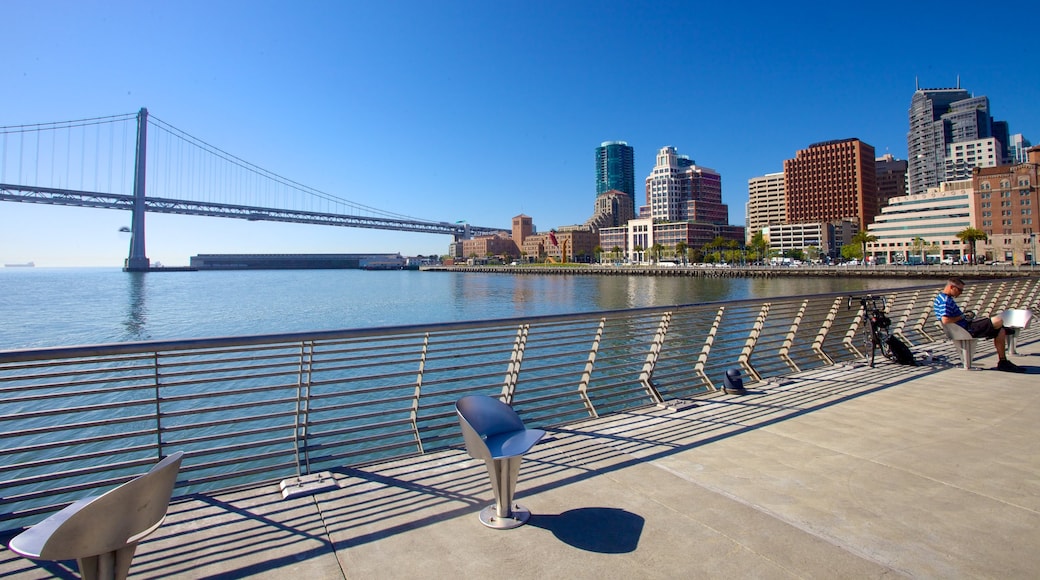 Bay Bridge showing a bridge, a river or creek and a city