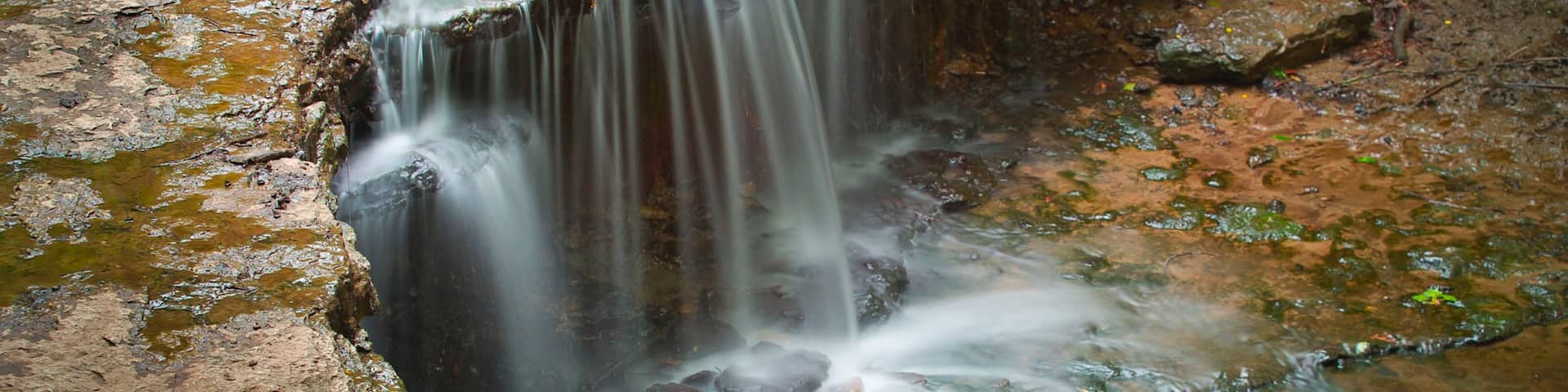 Lincoln featuring a waterfall and a river or creek
