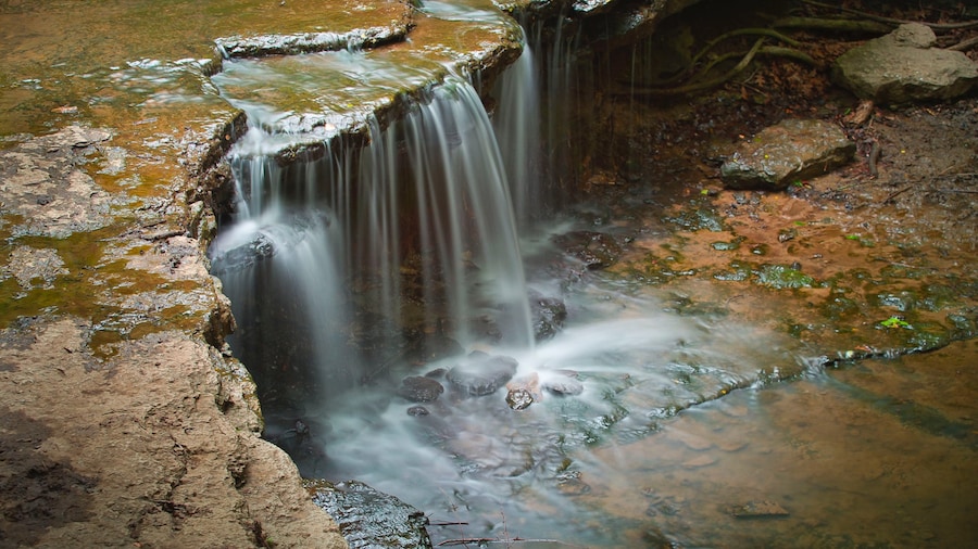 Lincoln featuring a waterfall and a river or creek