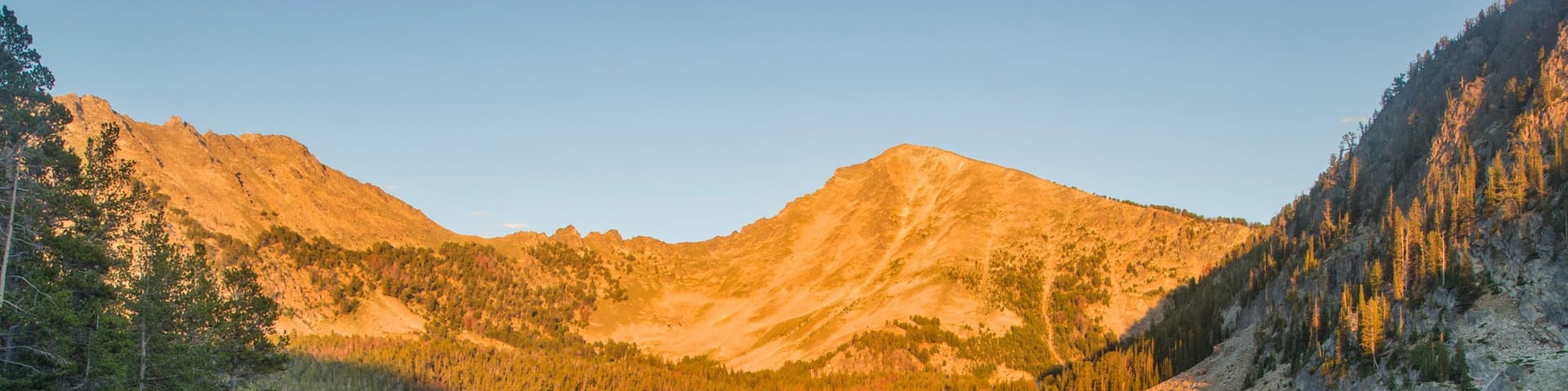 Southwest Montana showing a sunset, forest scenes and a lake or waterhole