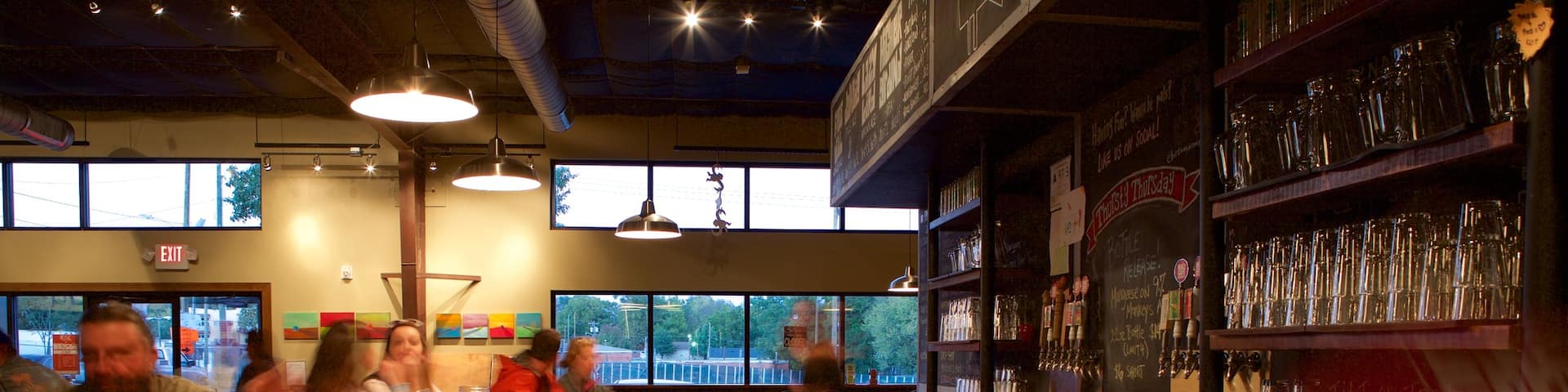 Charlotte featuring interior views as well as a small group of people