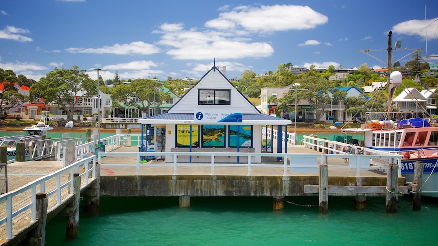 Russell featuring a bay or harbor and a coastal town