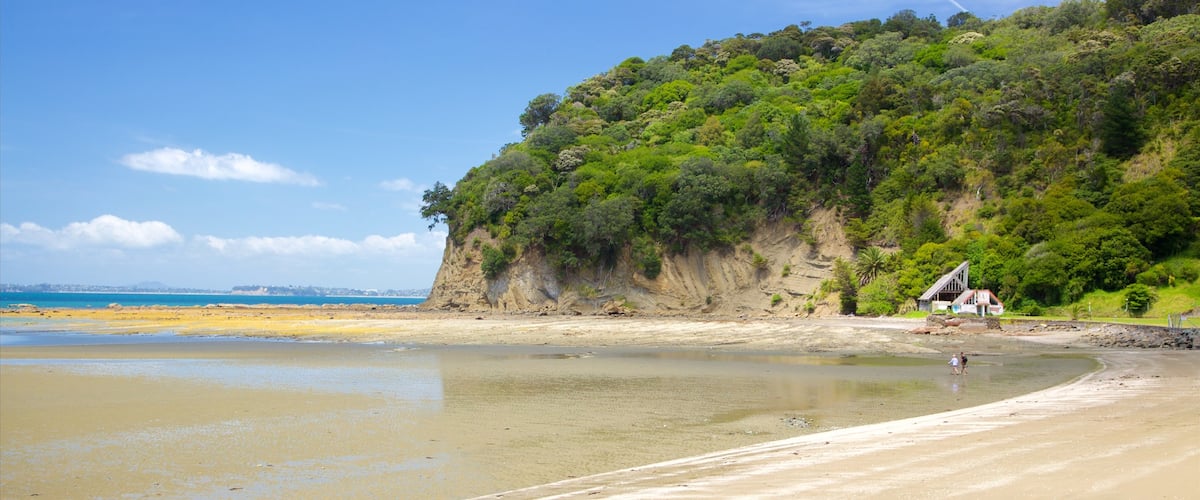 Waiwera which includes a bay or harbour, a sandy beach and rocky coastline