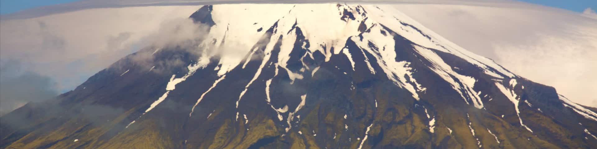 Cape Egmont Lighthouse which includes mountains and snow