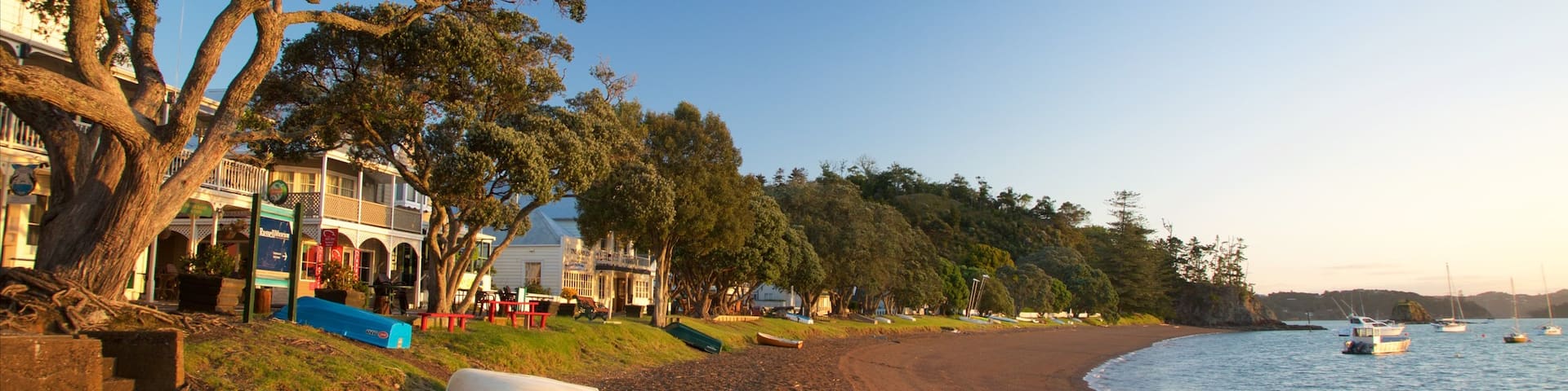 Russell Beach featuring a bay or harbor, a coastal town and a sandy beach